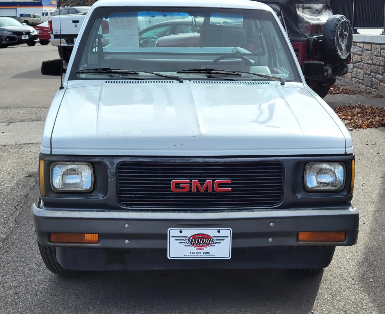 1991 White /Red GMC Sonoma Special (1GTCS14E9M8) with an 2.5L I4 engine, 5 Speed manual transmission, located at 450 N Russell, Missoula, MT, 59801, (406) 543-6600, 46.874496, -114.017433 - 2.5L I4 Engine. 5 Speed Manual Transmission. Runs and Drives well. Financing NOT Available on this Vehicle. - Photo#4